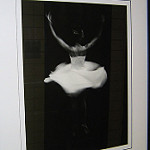 Ballerina dancing in black and white photo